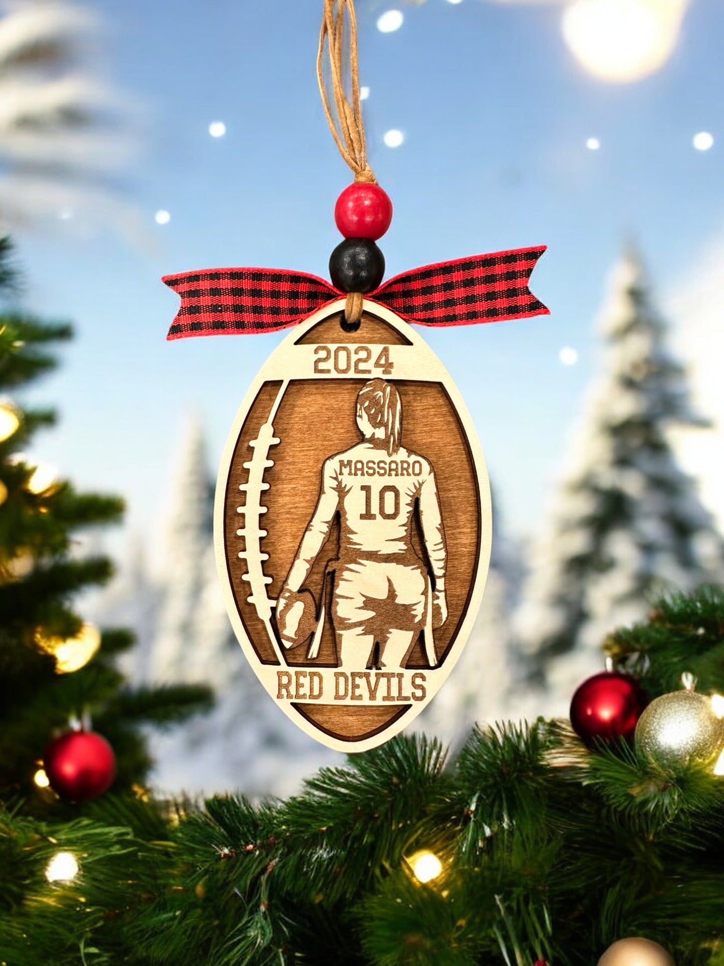 Personalized Flag Football Girl Christmas Ornament with player jersey number, name, team name, and year. The perfect Christmas gift.