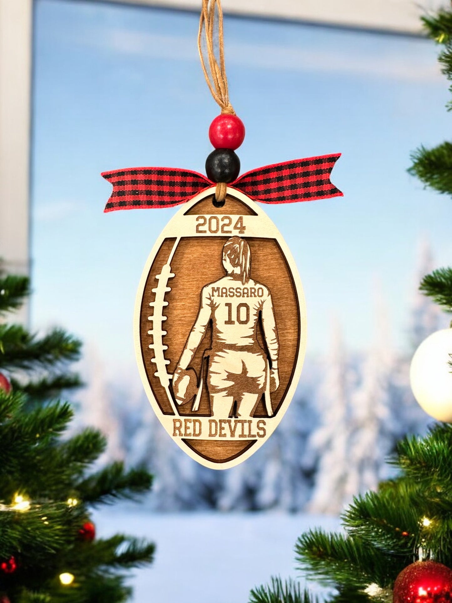 Personalized Flag Football Girl Christmas Ornament with player jersey number, name, team name, and year. The perfect Christmas gift.