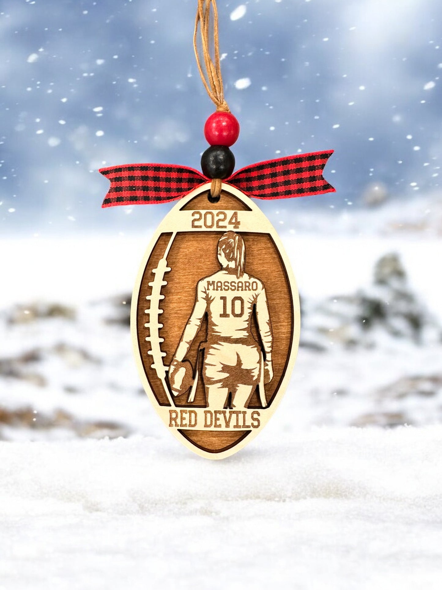 Personalized Flag Football Girl Christmas Ornament with player jersey number, name, team name, and year. The perfect Christmas gift.