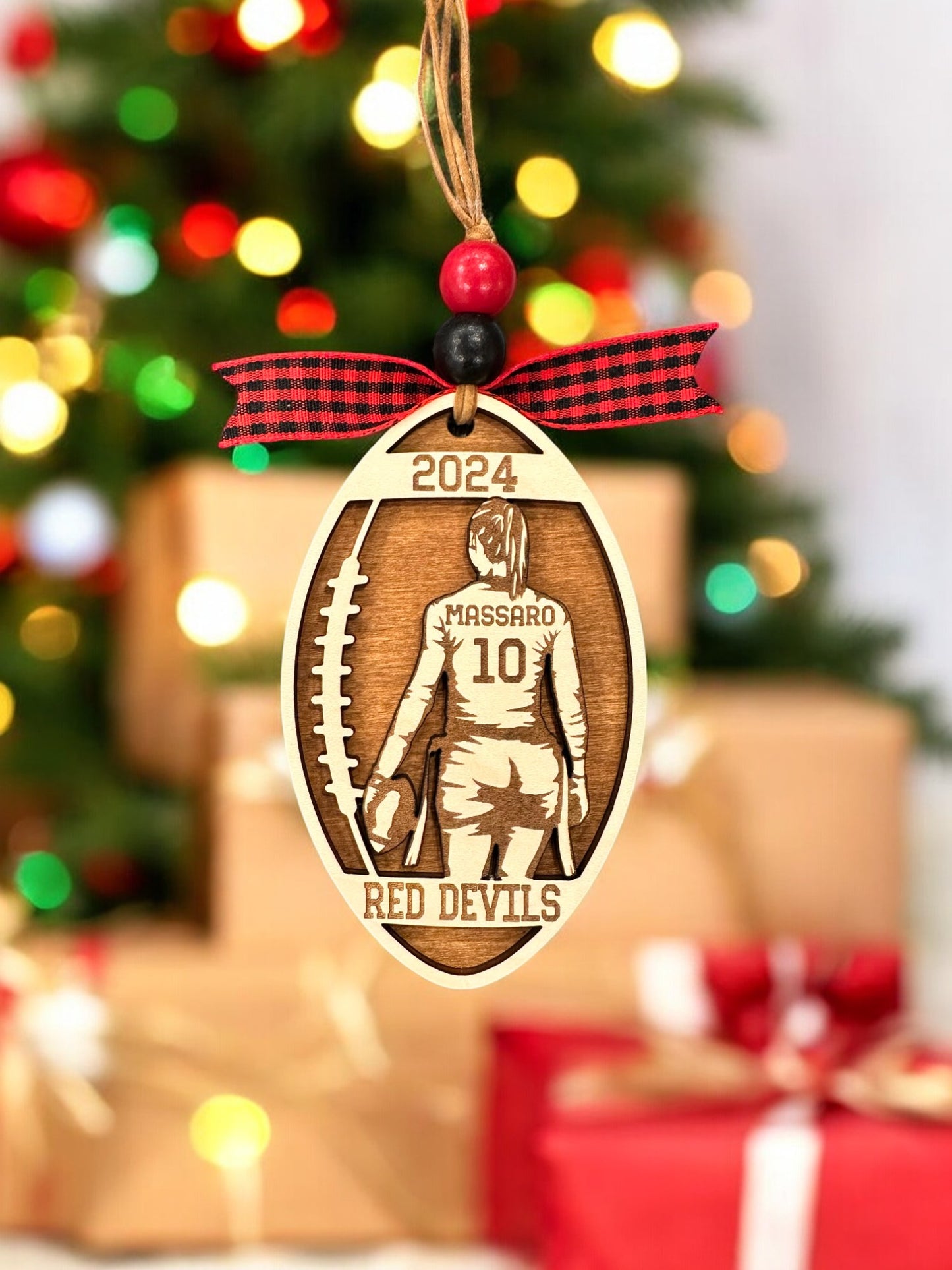 Personalized Flag Football Girl Christmas Ornament with player jersey number, name, team name, and year. The perfect Christmas gift.