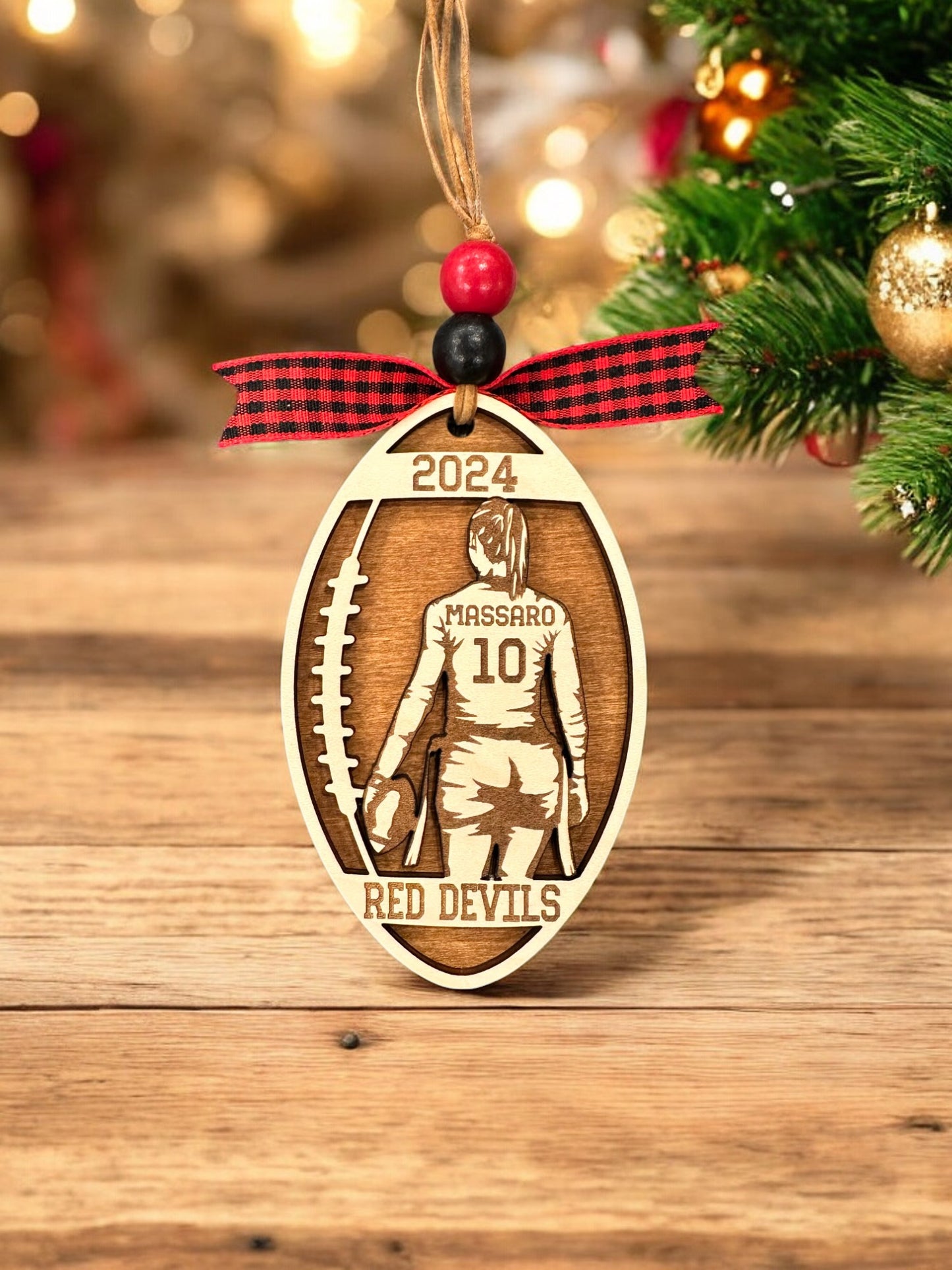 Personalized Flag Football Girl Christmas Ornament with player jersey number, name, team name, and year. The perfect Christmas gift.