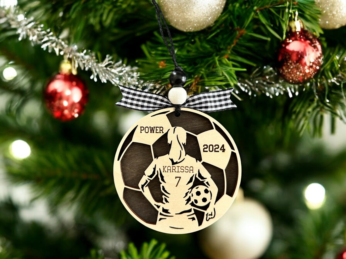 Personalized Soccer Girl Christmas Ornament with player jersey number, name, team name and year. The perfect Soccer lovers Christmas gift.