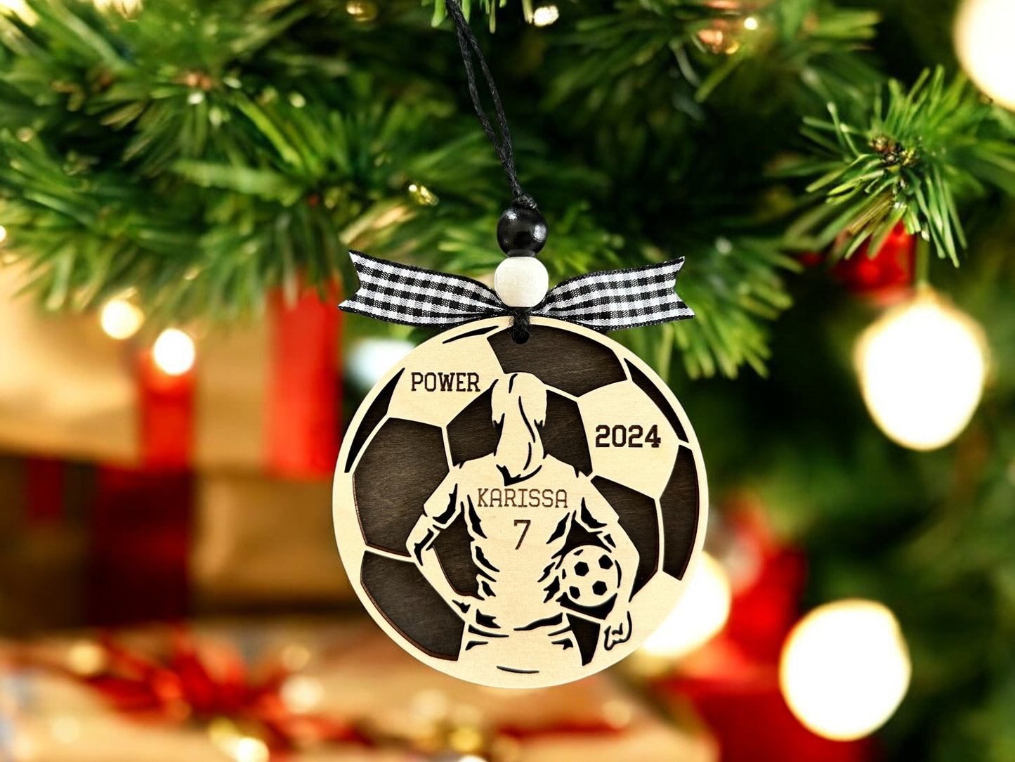 Personalized Soccer Girl Christmas Ornament with player jersey number, name, team name and year. The perfect Soccer lovers Christmas gift.