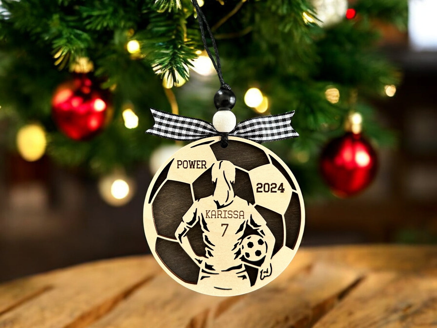 Personalized Soccer Girl Christmas Ornament with player jersey number, name, team name and year. The perfect Soccer lovers Christmas gift.